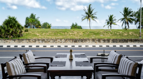 Comfortable outdoor seating at our Karon Beach Italian restaurant