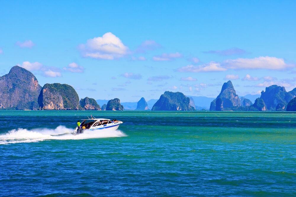 See the sights of Phang Nga Bay from a speedboat.