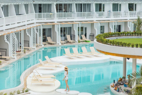 Our luxury swimming pool is designed to mimic a beach